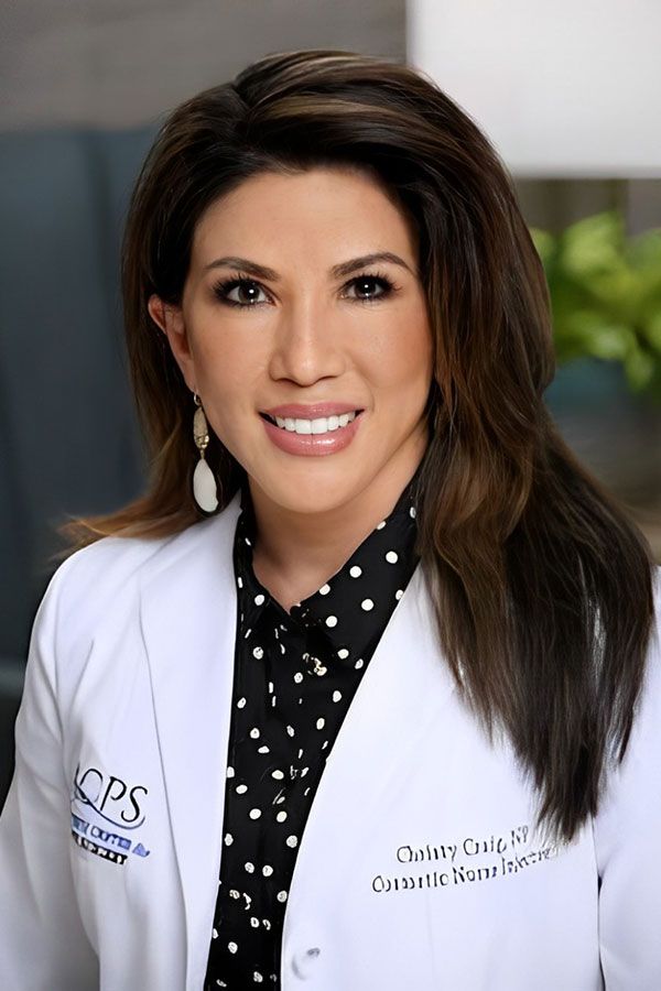 Female doctor smiling in professional attire