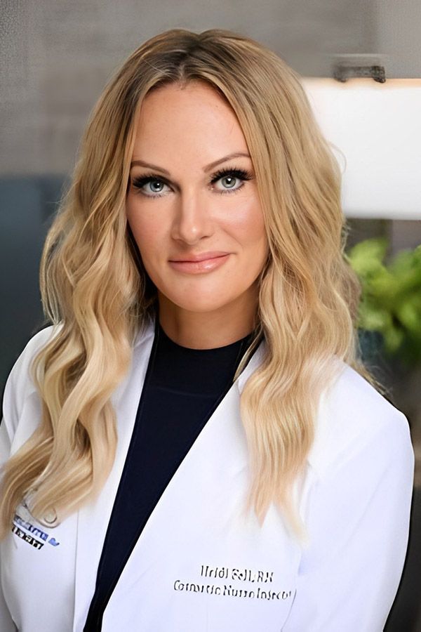 Female professional in white medical coat.