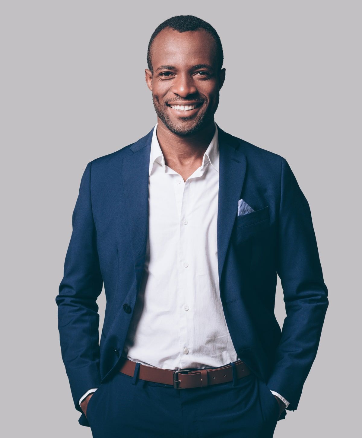 Smiling man in a professional suit and tie.